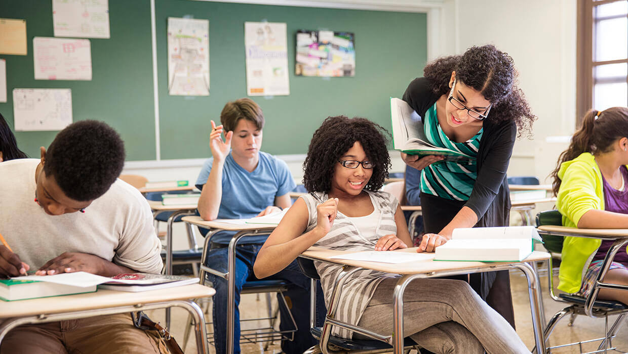 Markets-Education-Female-Teacher-with-High-School-Students