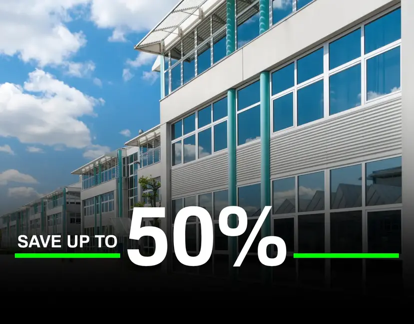 Modern commercial office buildings showcasing 2026 geothermal tax incentives and up to 50% savings on ClimateMaster energy-efficient HVAC systems.